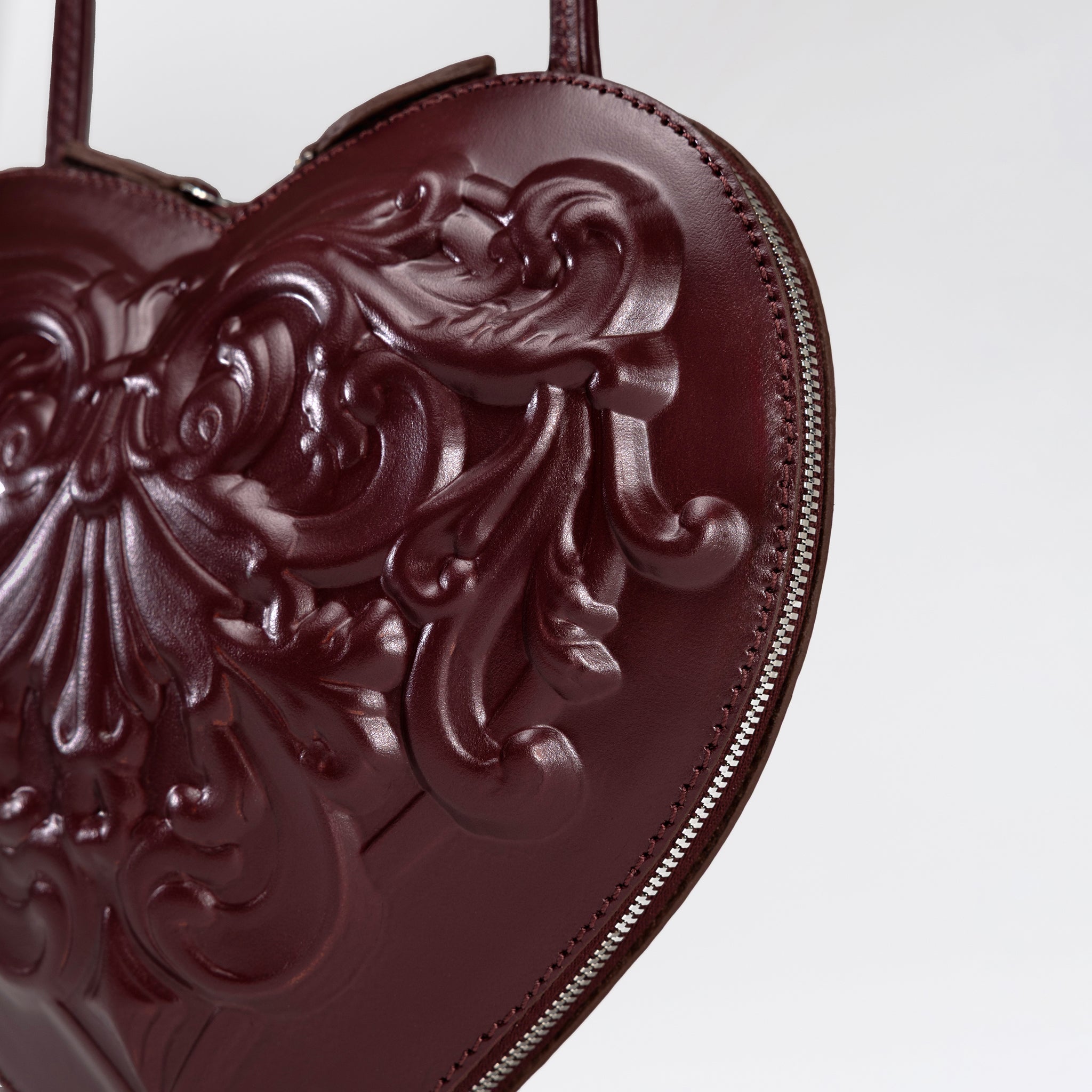Burgundy Heart-Shaped Leather Bag with Baroque Relief